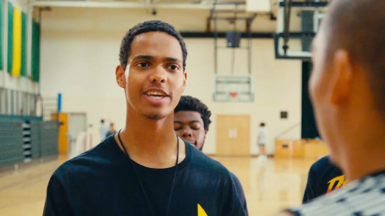 Ephram in the basketball-gym scene from the final Shoot Your Shot commercial